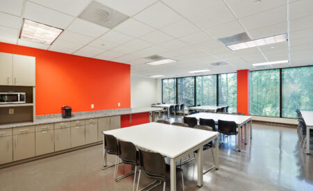 Kitchen, dining area, and open workspace at LocalWorks Atlanta